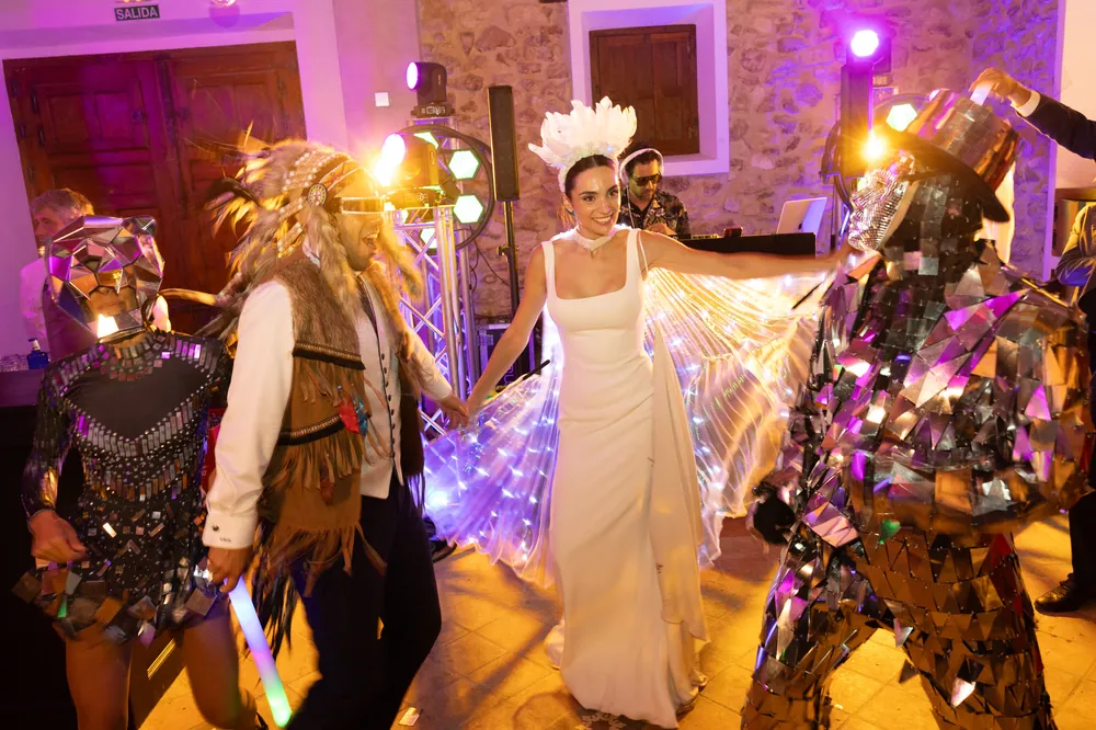 The bride dancing with the street performers
